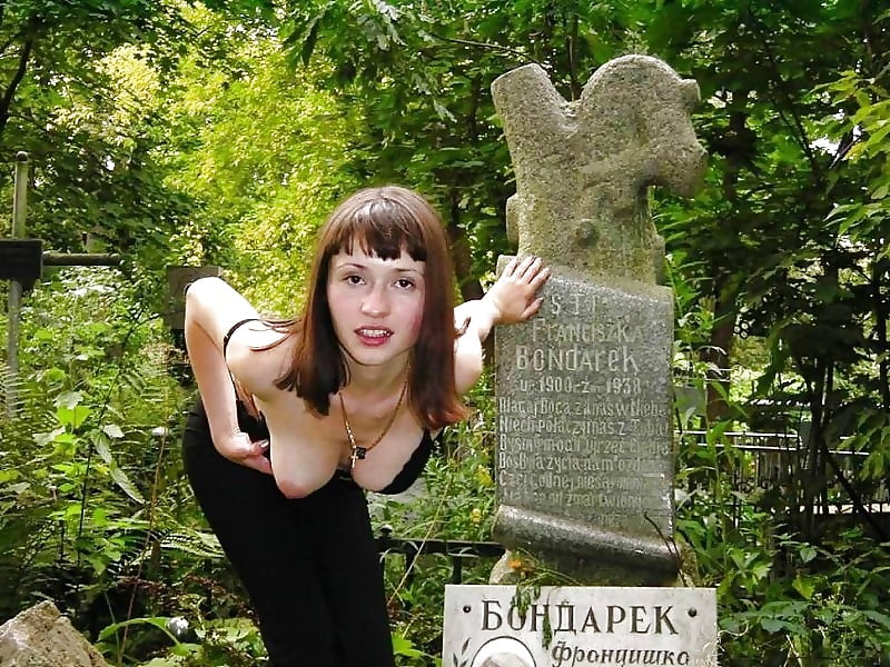 Naked women in cemetery