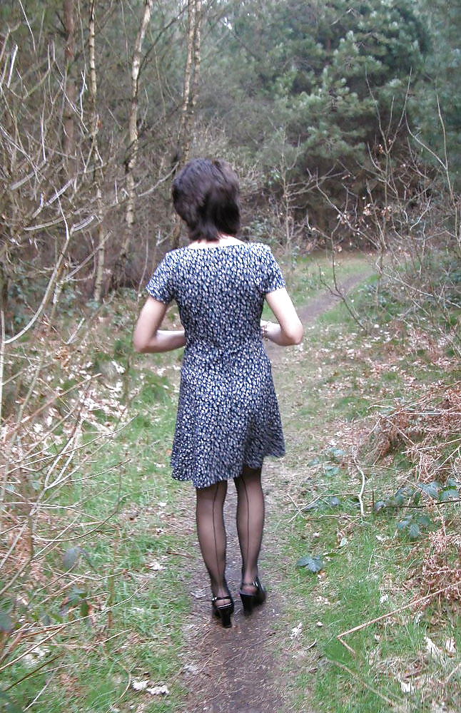 Amateur mature lady takes a walk in the woods. pict gal