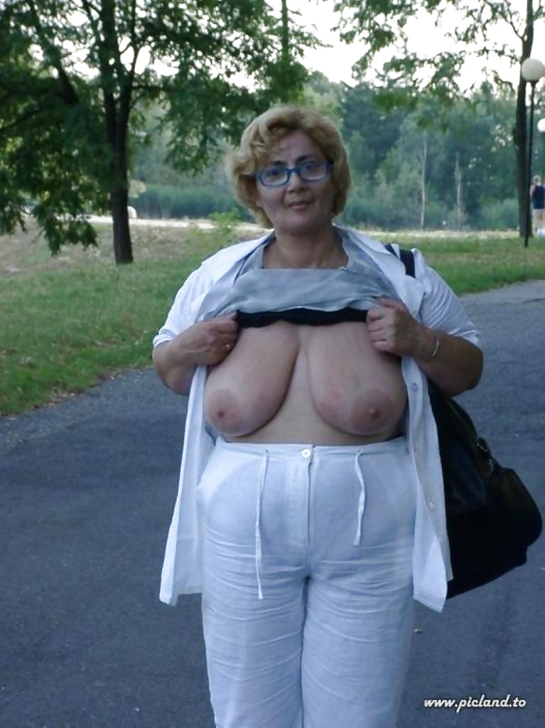 Hot Anonymous Granny Flashing A Bit Of Her Old Tits.