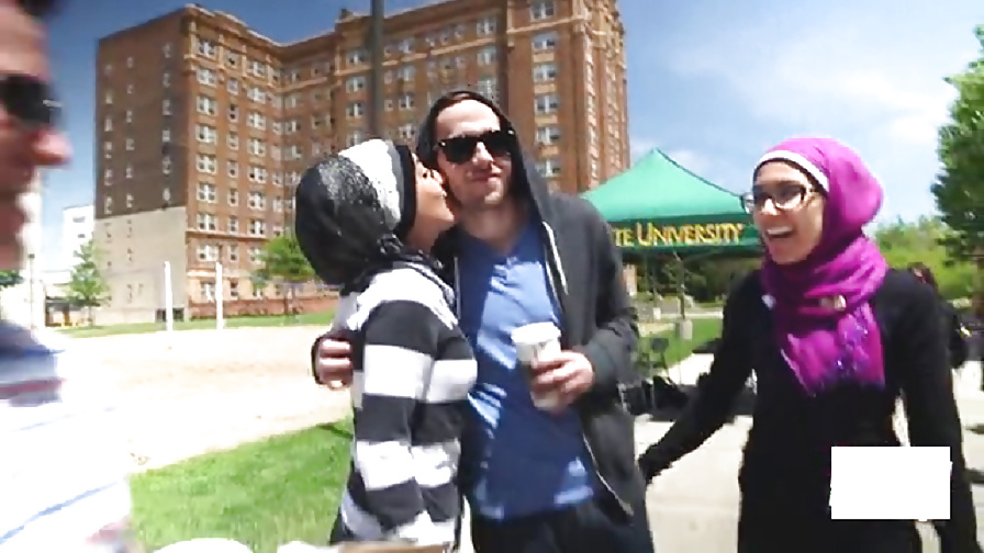 Veiled Arab slut kissing white dude pict gal