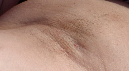 Hairy unshaven for a few days armpit of my wife.