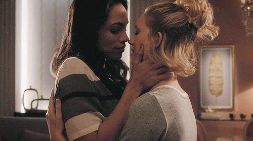 Sensual lesbian kiss.