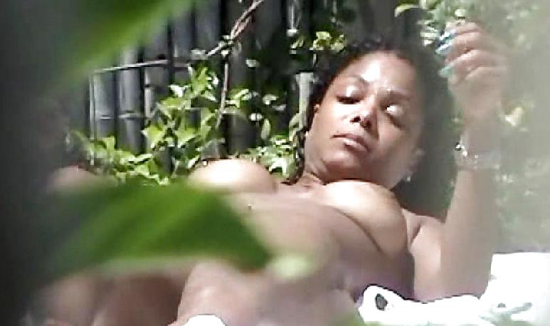 Janet jackson sunbathing naked photo.