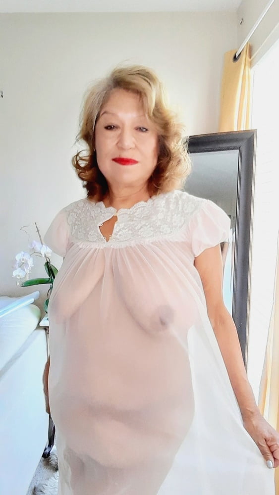 Mature bbw woman in a transparent night gown - 7 Pics 