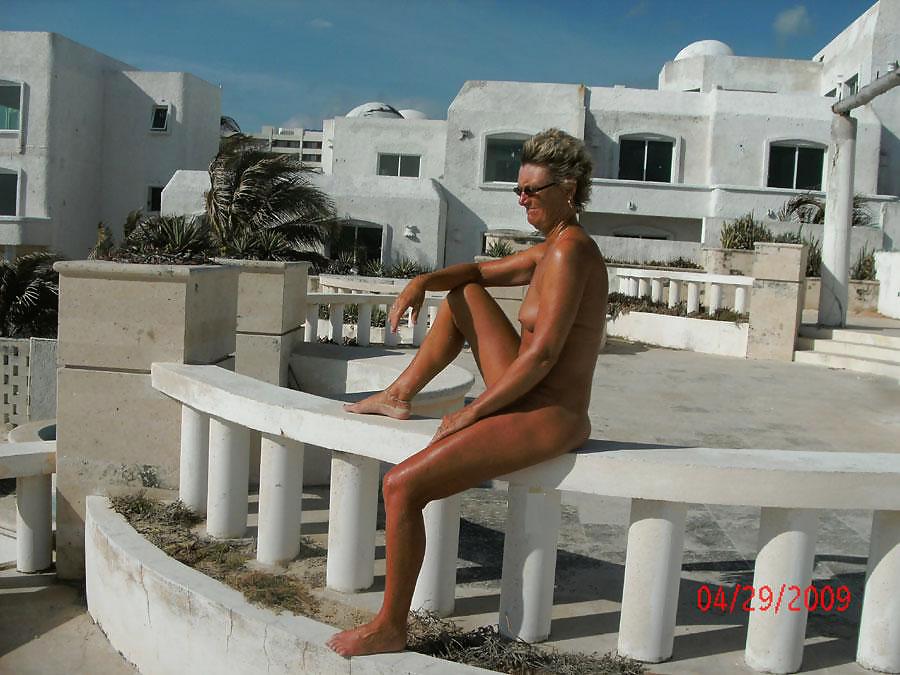 Mature Nudist Lady Striking A Pose pict gal