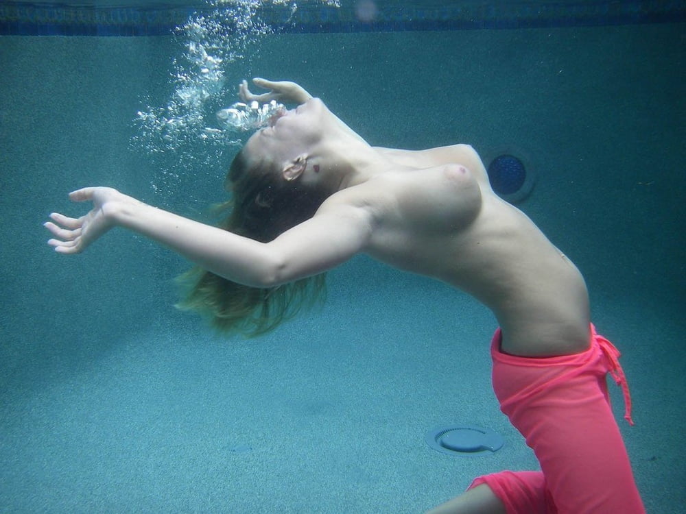 Underwater boobs titties floating. 
