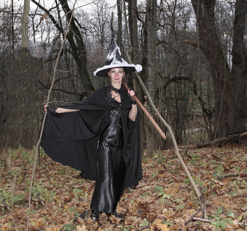 Witch with broom in forest - 51 Pics 