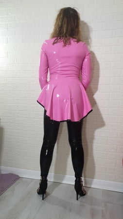 pink riding jacket and black leggings from latex and lovers         