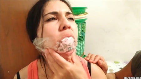 gagged with   socks and clear tape gag selfgags         