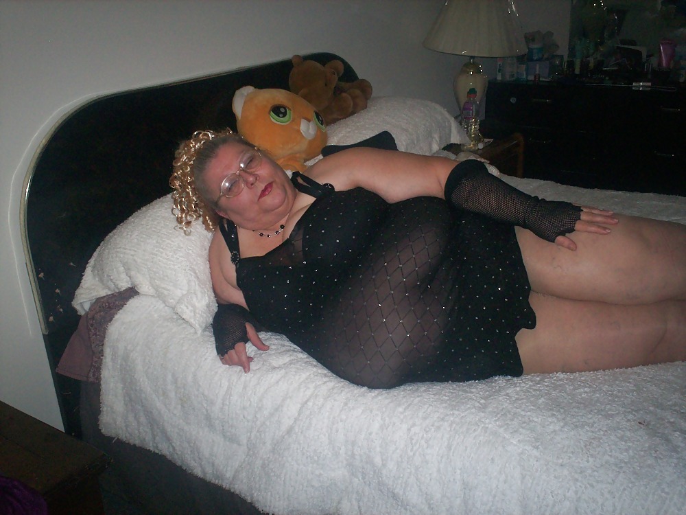 her in pantyhose on the bed pict gal