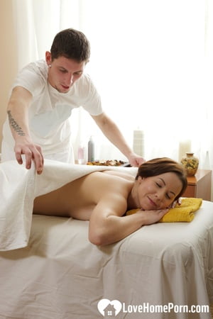 long haired brunette gets a cock from her masseur         