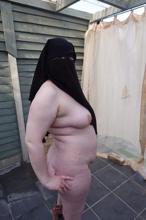 nude in niqab in ankle boots         