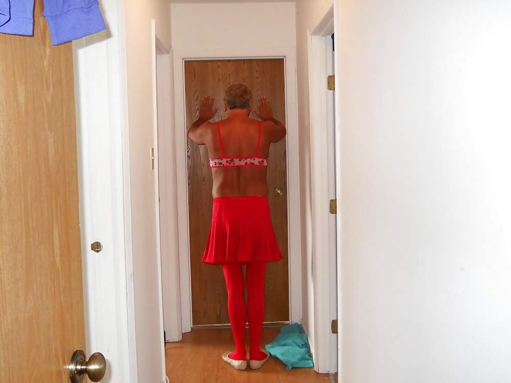 Betsy in her sissy cheerleading skirt pict gal