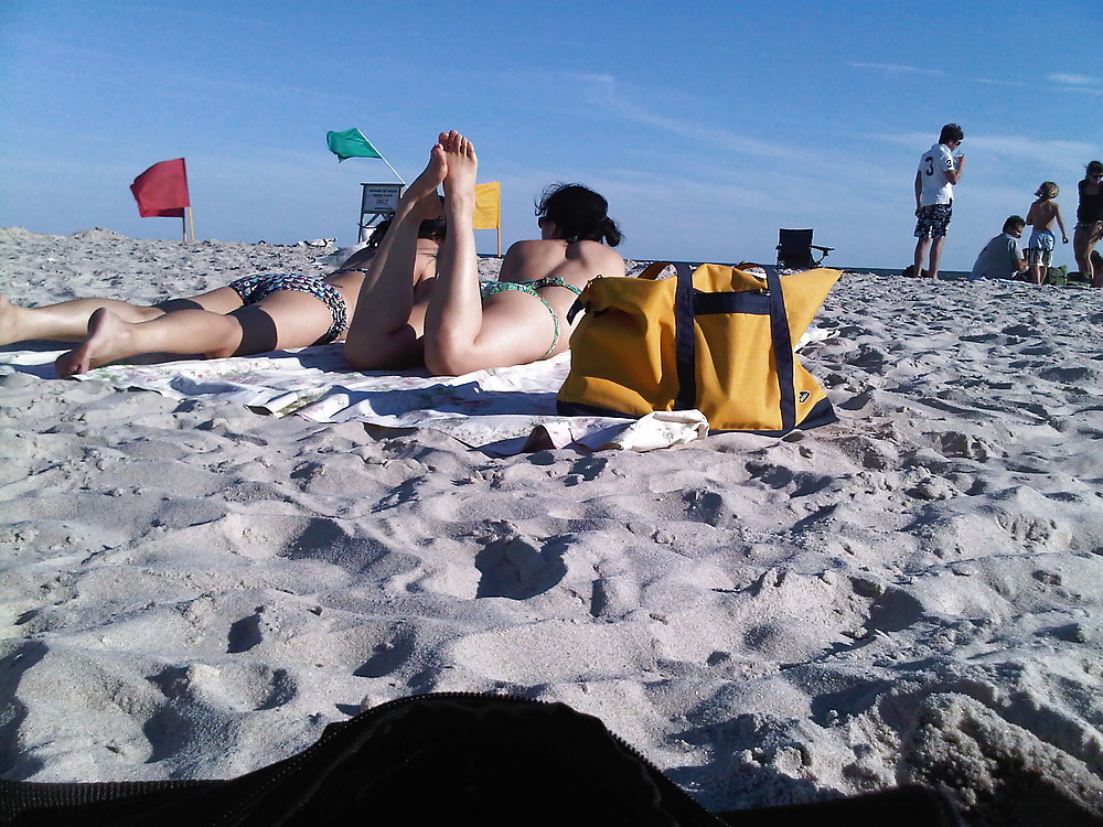 asians laying on the beach pict gal