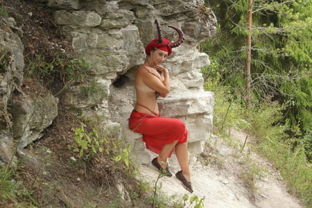 forest satyr on the rock         