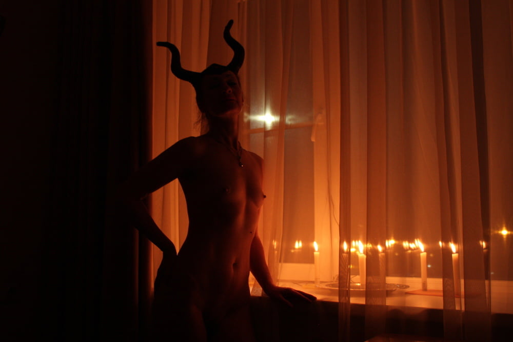 Naked Maleficent with Candles - 24 Photos 