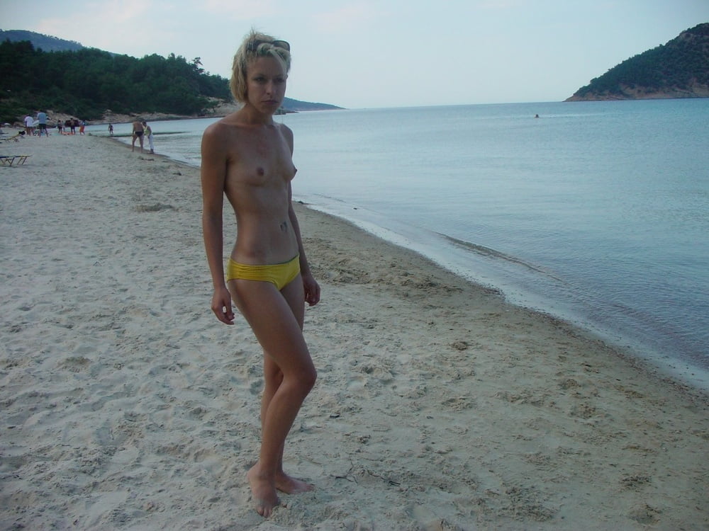 Small titties, hard nipples, beach pict gal