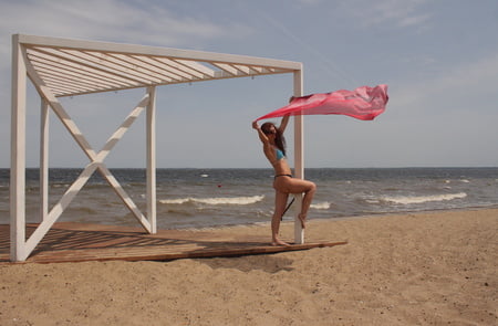 red shawl on windy weather         