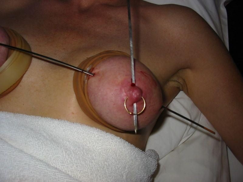 Extreme Tits Pain Torture Nails Needles Skewers Pics.