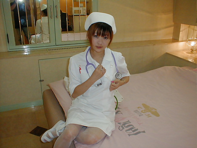 Japanese amateur dressed in nurse's in the hotel room pict gal