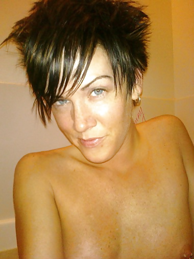 Sexy Short Haired Brunette Amateur Posing pict gal