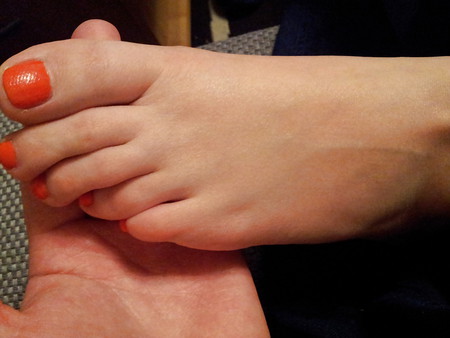 wifes feet orange nails